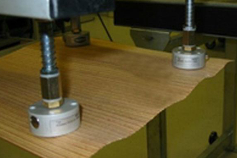 Gripping system for wooden boards